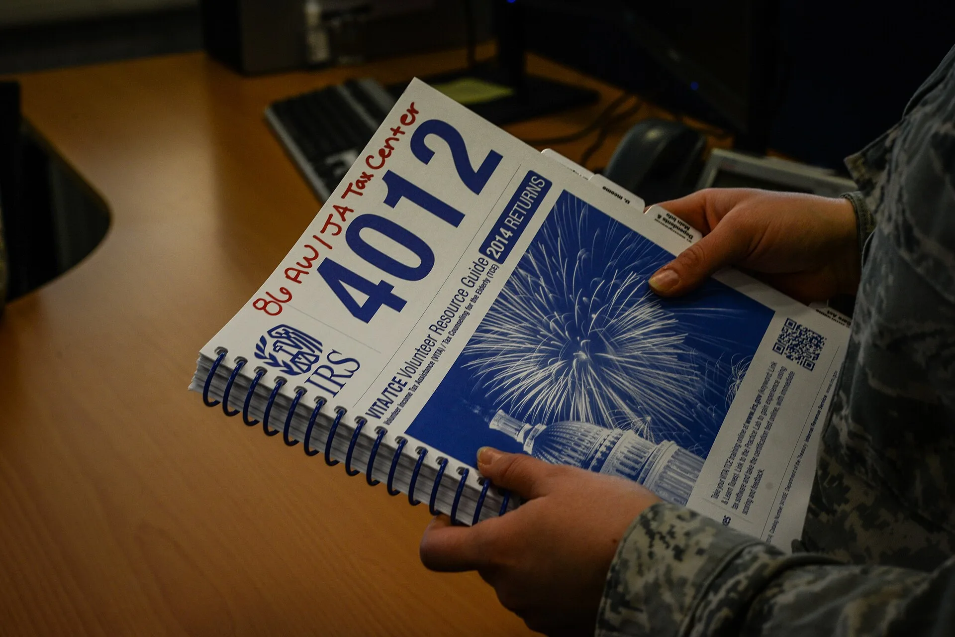 Senior Airman Alexy Doran, 86th Civil Engineer Squadron emergency management journeyman, references a tax return guide at Ramstein Air Base, Germany, March 6, 2015. More than 60 volunteers work diligently, crunching numbers to save Airmen money through the months of February to June. (U.S. Air Force. Chart of accounts framework: four layers and six steps derived from reports